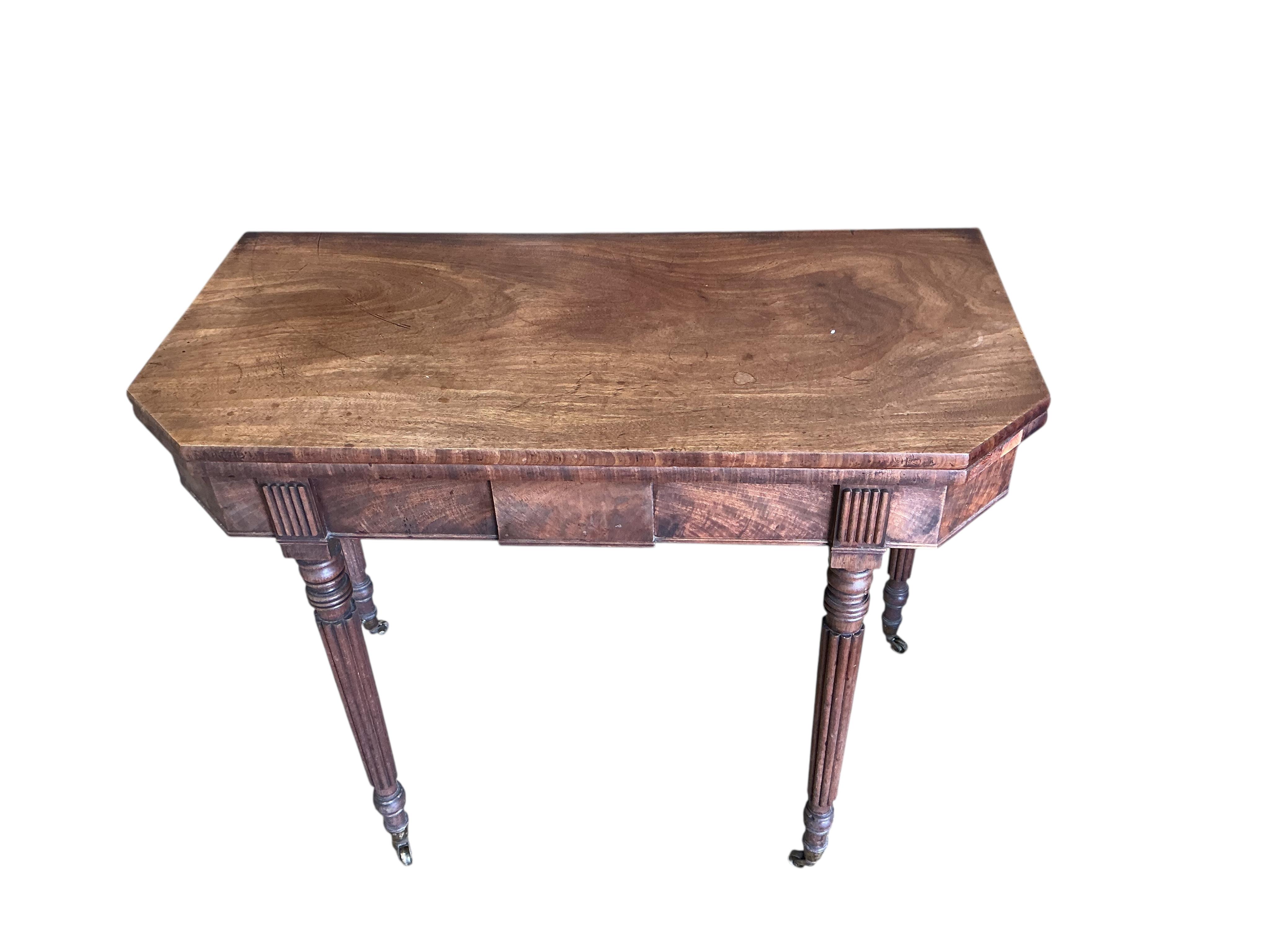 A Regency mahogany folding tea table, width 91cm, depth 45cm, height 74cm
